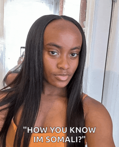 a woman with long hair says " how you know im somali ? "