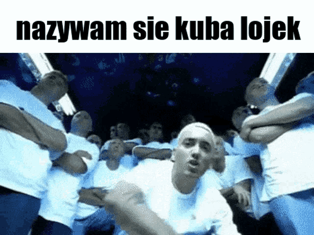 a group of men are standing in a dark room with the words nazywam sie kuba lojek written above them
