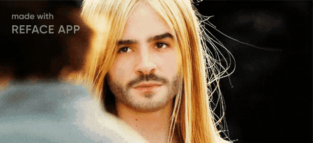 a picture of a man with long blonde hair and a beard is made with reface app