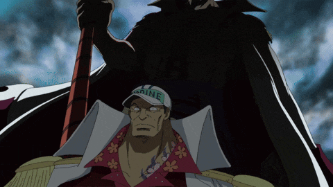 a man wearing a marine hat is holding a sword