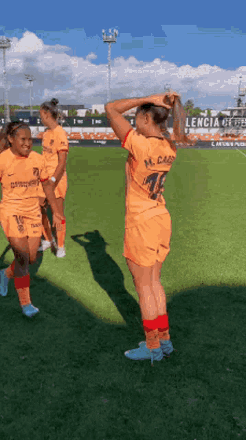 a soccer player with the number 11 on her back