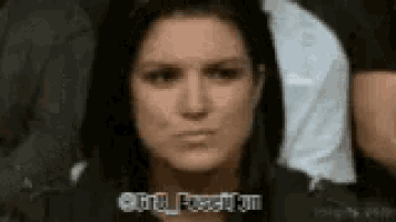 a close up of a woman 's face with a caption that says girl pushed on