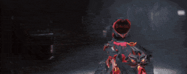 a red and black motorcycle with a flame on it