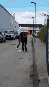 a renault van is parked on the side of the street