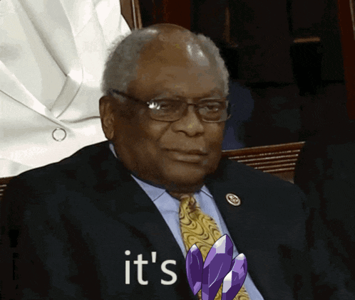 a man in a suit and tie with the word it 's written on his chest