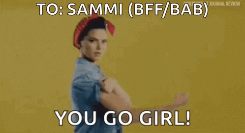 a woman in a red headband is flexing her muscles and says `` you go girl ! ''