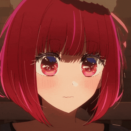 a close up of a girl with red hair