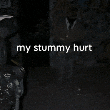a man standing in front of a wall with the words " my stump hurt "