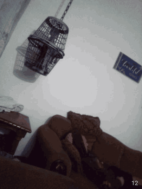 a picture of a living room with a sign that says beautiful on the wall