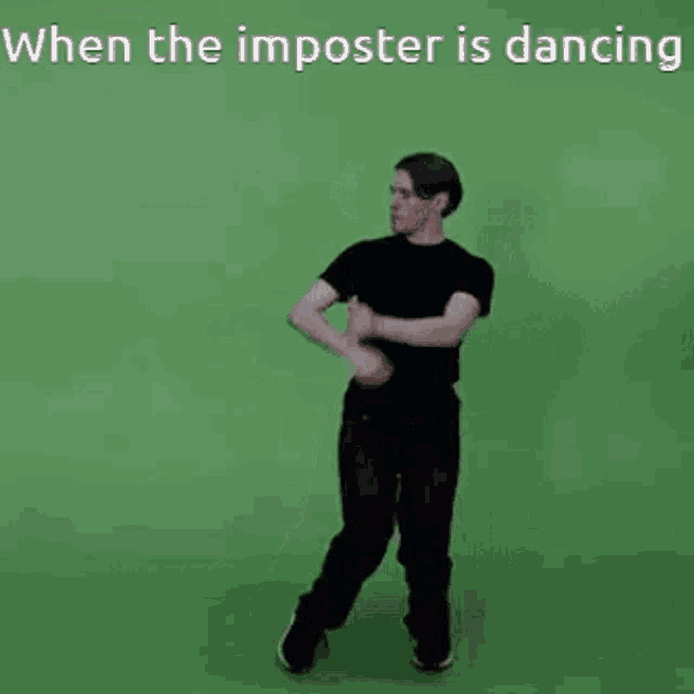 a man in a black shirt is dancing on a green background .