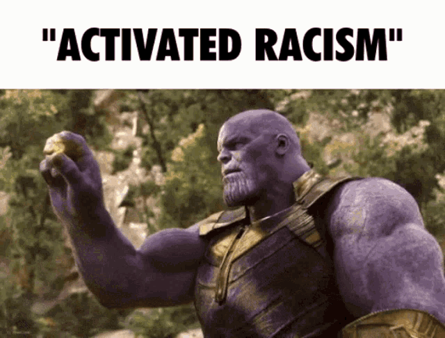a purple thanos holding a gold object with the words " activated racism " written below him