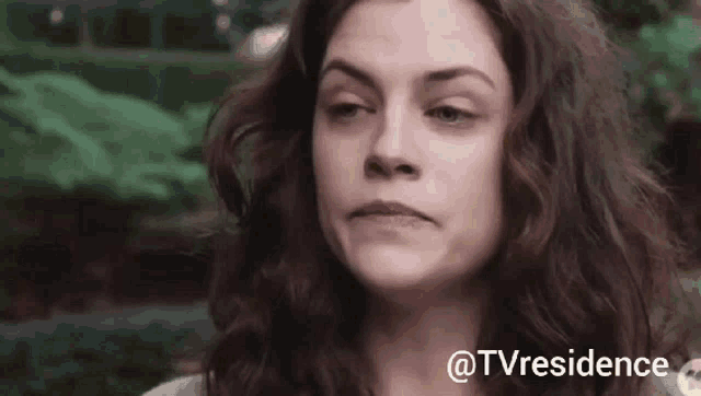a close up of a woman 's face with the words @tvresidence at the top