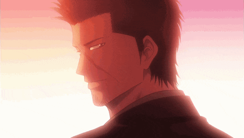 a close up of a man 's face against a pink background