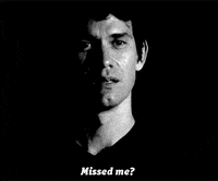 a black and white photo of a man 's face with the words `` missed me '' written on the bottom .