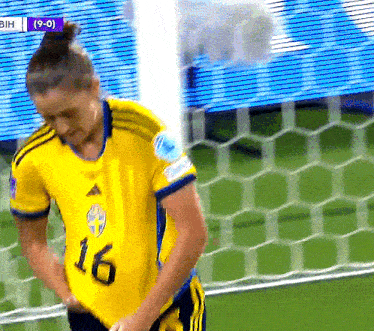 a soccer player with the number 16 on their shirt