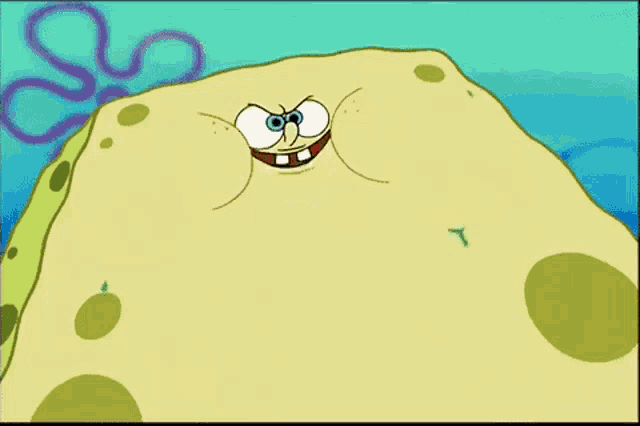 a cartoon spongebob squarepants character is making a funny face while swimming in the ocean .