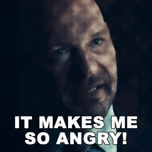 a man in a suit and tie is saying " it makes me so angry "