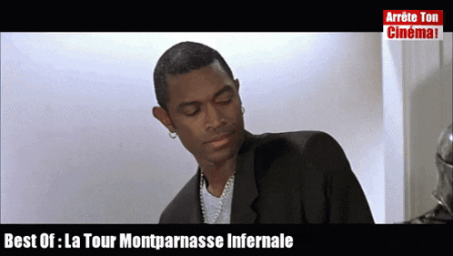 a man in a suit and pearls is featured on a screen that says best of la tour montparnasse infernale