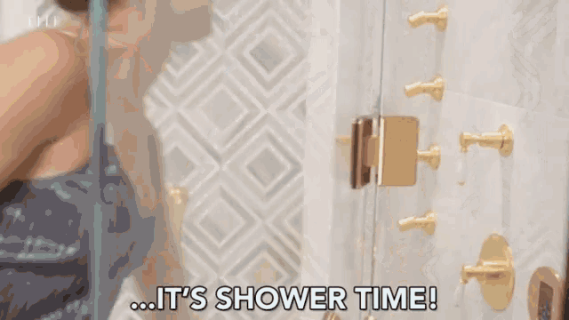 a woman is taking a shower and says it 's shower time ..