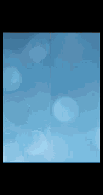 a picture of a blue sky with white circles