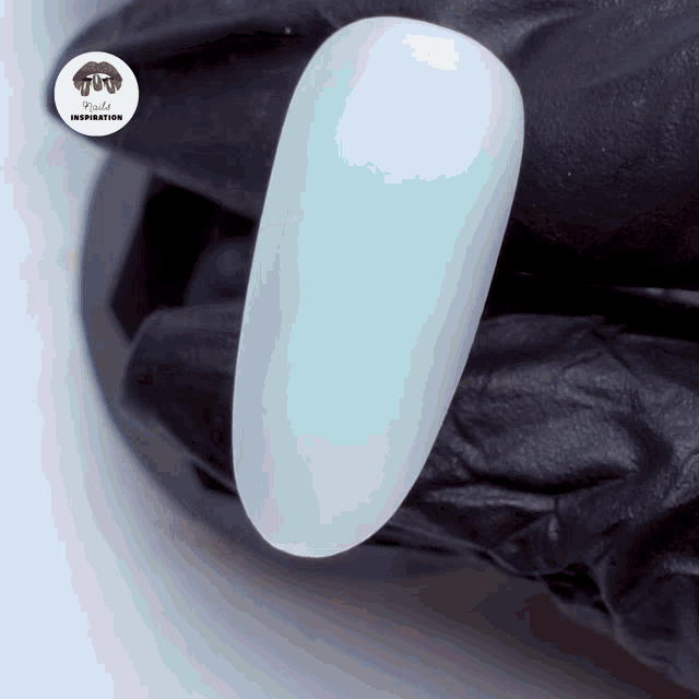 a close up of a nail with lipstick inspiration written on the corner