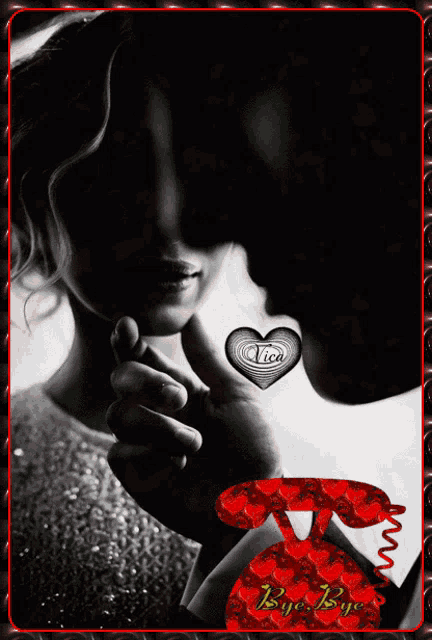 a black and white photo of a man kissing a woman 's neck and a red phone with hearts on it