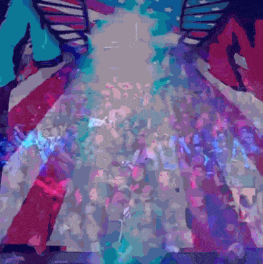 a painting of a crowd of people in a stadium with a flag in the background