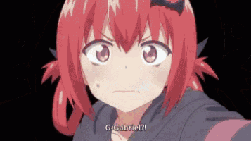 a girl with red hair says g-gabriel on a black background .