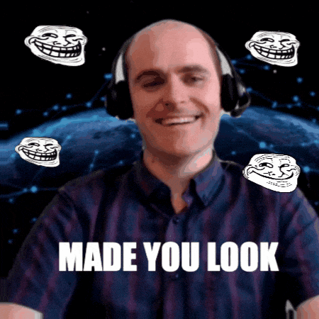 a man wearing headphones is surrounded by troll faces and the words " made you look "