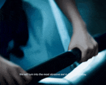 a blurred image of a person 's hands with the words " we will turn into the most abrasive awl in the world today "