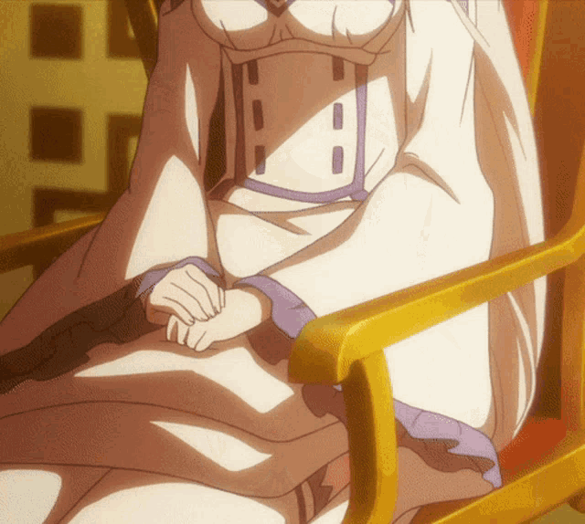 a woman in a white and purple dress is sitting in a chair