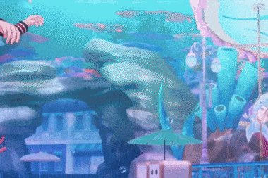 a pixel art painting of a coral reef with umbrellas and buildings