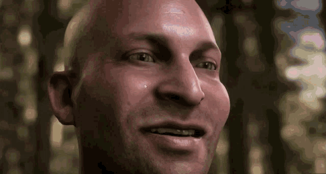 a close up of a bald man 's face with a tear coming out of his eye