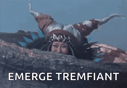 a person is laying on their back on a rock with the words emerge tremfiant written above them .