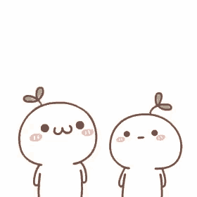 two cartoon characters with green leaves on their heads are standing next to each other .