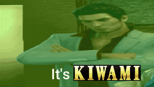 a man in a suit has his arms crossed in front of a green background that says it 's kiwami
