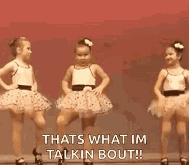 two little girls are dancing together and one of them is saying `` thats what im talkin bout ! ''