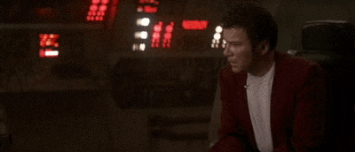 a man in a red jacket is saying " this is more fucked up than i thought "