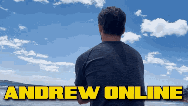 a man looking out over a body of water with the words andrew online above him