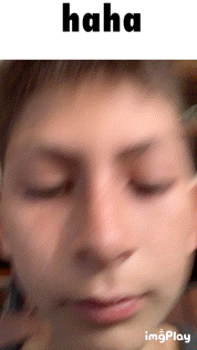 a close up of a person 's face with the word haha written above it