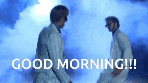 two men are dancing in front of a blue sky and the words good morning !!!