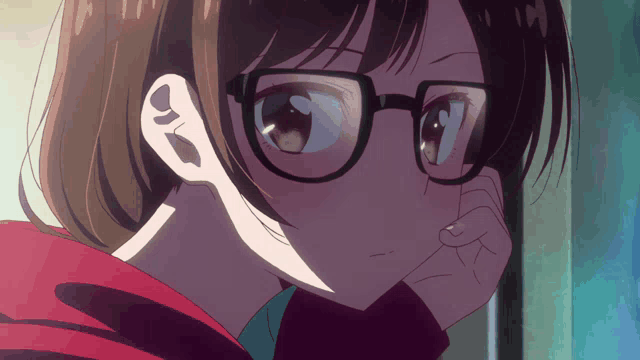 a close up of a girl with glasses on