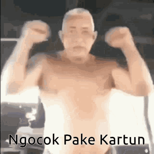a shirtless man is flexing his muscles with the words ngocok pake kartun in the background .