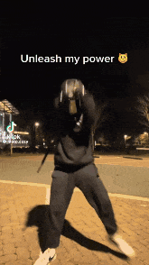 a tiktok video of a man lifting weights with the caption unleash my power
