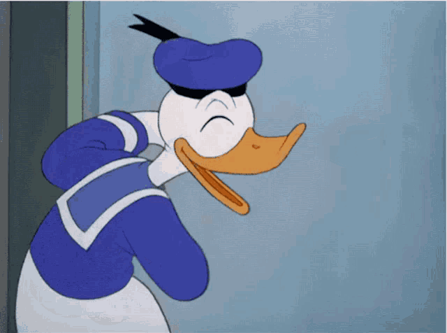 donald duck is pointing at something in the distance