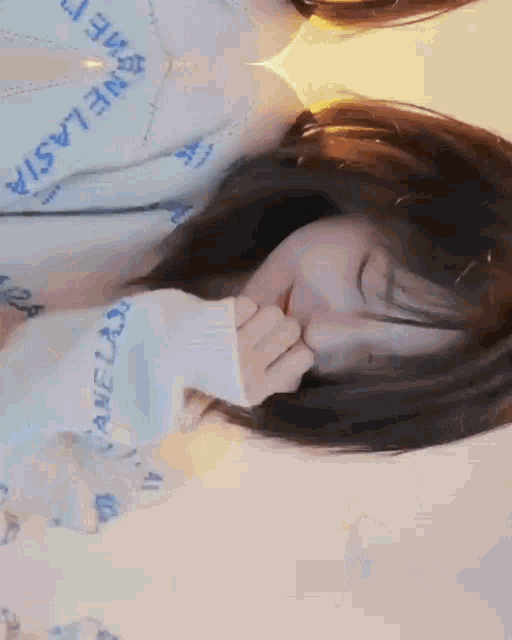 a girl wearing a sweater that says ' amelia ' on it