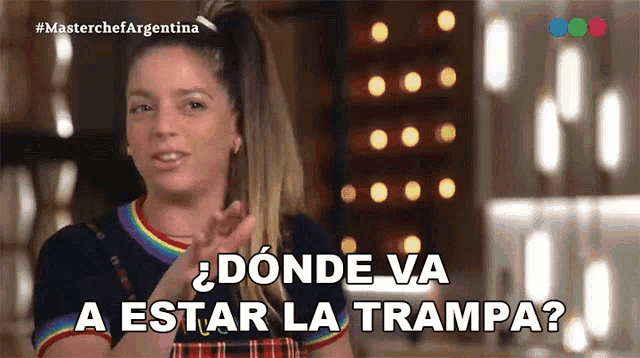 a woman says " donde va a estar la trampa " on a screen