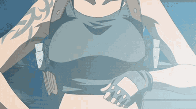 a woman with a tattoo on her arm is wearing a black tank top and gloves