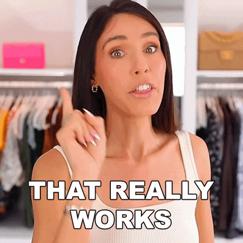 a woman says that really works in front of a wardrobe
