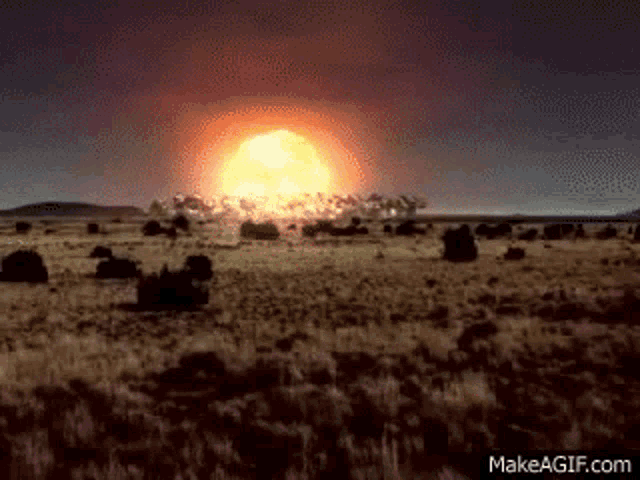 a nuclear explosion in the middle of a desert .